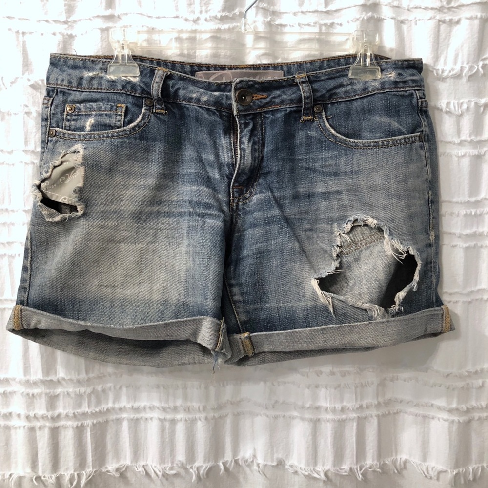 Very distressed jean shorts